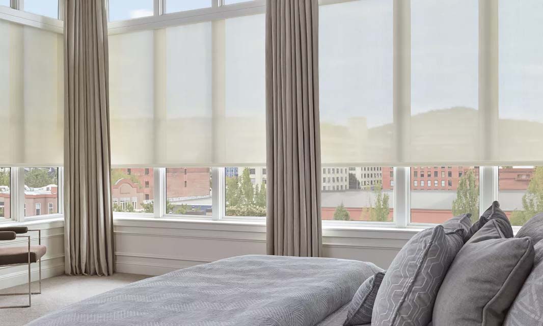 Lutron Solar shades in a white loft