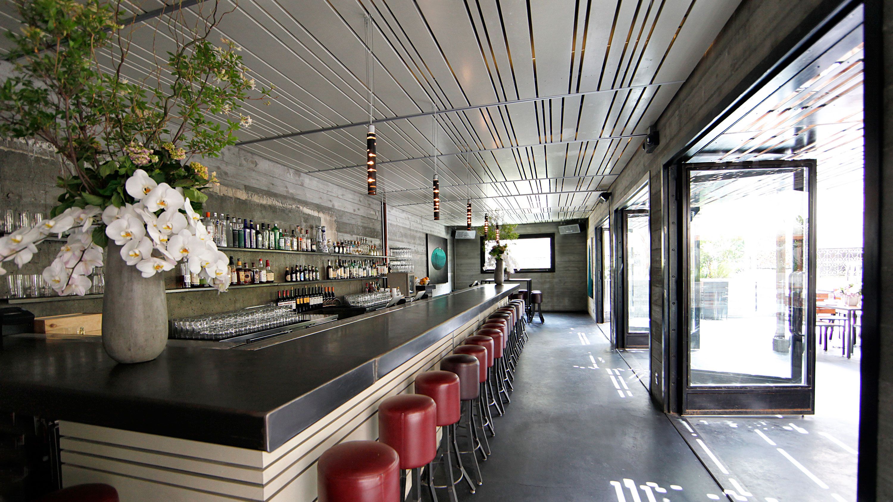 control4 technology in a bar with open doors and LED lighting